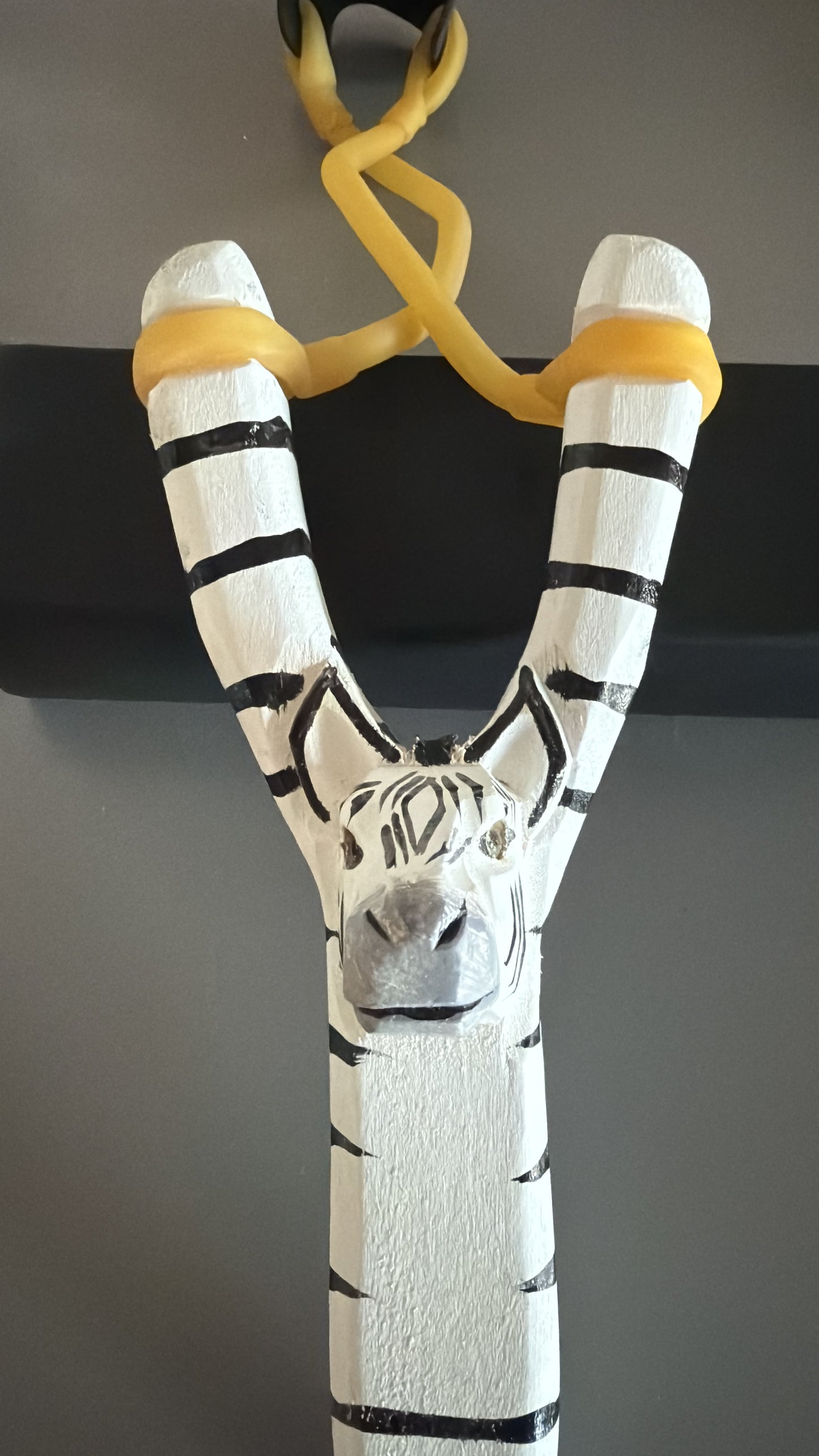 Steinschleuder mit Tiermotive